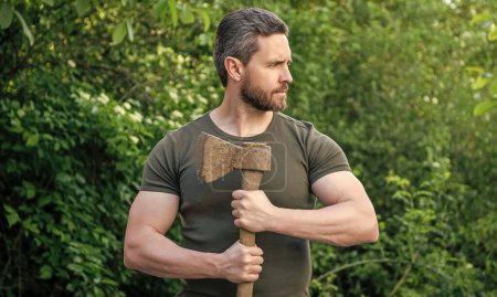 Photo for Masculine man with ax outdoor. mature man with ax. man with ax. man with ax wearing shirt. - Royalty Free Image