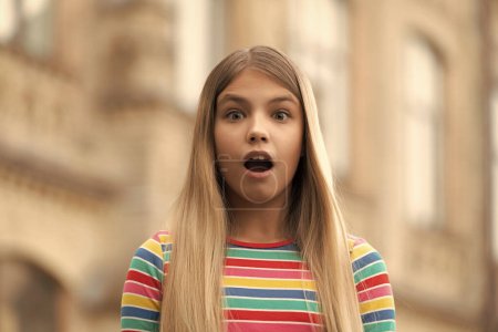 Photo for Portrait of surprised teen girl. portrait of teen girl with blonde hair. portrait of teen girl outdoor. portrait of teen girl outside. - Royalty Free Image