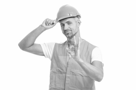 Photo for Photo of man laborer wearing reflective vest, ok. man laborer isolated on white. man laborer in white studio. man laborer on background. - Royalty Free Image