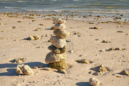 Photo for Zen like summer. stone pyramid at sea. summer nature with zen pebble. life equilibrium. balance and harmony in life. harmony and balance. zen pebble at beach. nature balance concept. inner calm. - Royalty Free Image