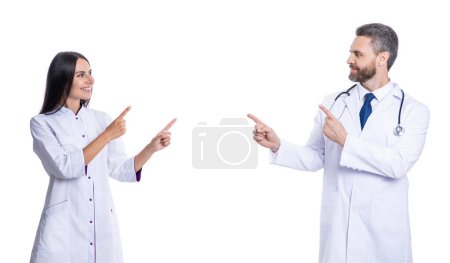 Photo for Doctor point finger on advertisement. medical service advertisement. two nurse and doctor in medicine hospital. healthcare physician doctor isolated on white. medicine and healthcare. copy space. - Royalty Free Image