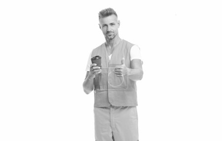Photo for Cheerful man worker with coffee isolated on white. man worker in white studio. man worker on background. photo of man worker wearing reflective vest. - Royalty Free Image