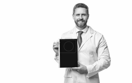 Photo for Doctor offering ehealth in studio, copy space. doctor presenting ehealth on background. photo of ehealth and doctor man with tablet. doctor promoting ehealth isolated on white. - Royalty Free Image