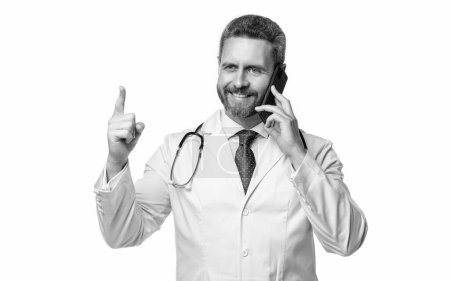 Photo for Physician online with raised finger on background. photo of physician online with phone. physician online isolated on white. physician online in studio. - Royalty Free Image