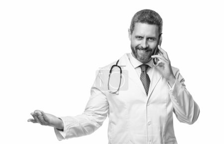 Photo for Photo of cheerful physician online with phone. physician online isolated on white. physician online in studio. physician online on background. - Royalty Free Image