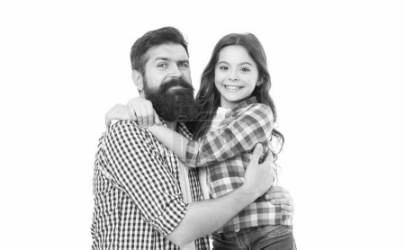 Foto de The first true love a girl has is her dad. Happy dad and adorable little daughter hugging and smiling. Bearded dad and small girl child wearing casual hipster style fashion. My dad is my love. - Imagen libre de derechos