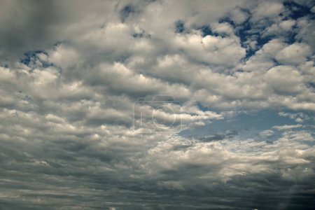cloudy blue sky with white fluffy clouds. background.