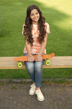 Photo for Happy teen girl skater with skateboard outdoor. girl with penny board. hipster girl with longboard skate. - Royalty Free Image