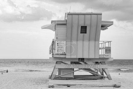 Miami Beach, Florida USA - April 19, 2021: green lifeguard tower on summer beach in miami.