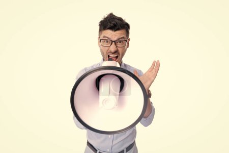 selective focus of man with megaphone announcement. man with megaphone isolated on white background. man with megaphone announcement in studio. man shouting announcement in megaphone.