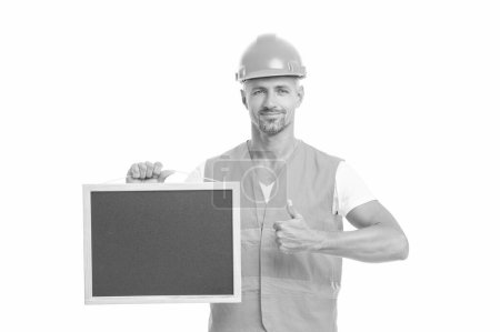 Photo for Builder show advertisement on background, thumb up. photo of builder show advertisement holding blackboard. builder show advertisement isolated on white. builder show advertisement in white studio. - Royalty Free Image