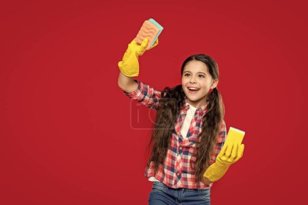 girl housecleaner do chores isolated on red, banner. girl housecleaner do chores in studio. girl housecleaner do chores on background. photo of girl housecleaner do chores with sponge.