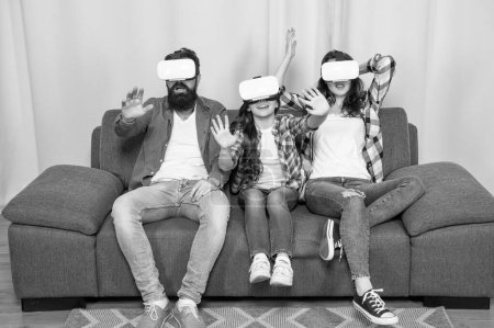 amazed mother father and daughter in virtual reality glasses, innovation.
