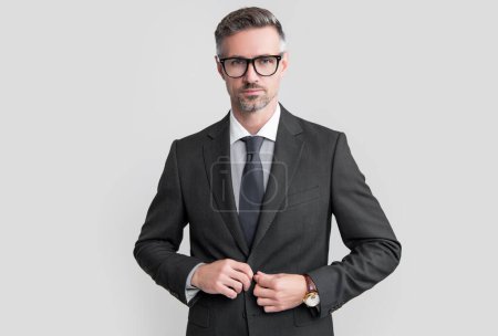 serious mature businessman in businesslike suit and glasses.