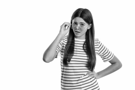 confused summer teen girl wear striped shirt isolated on white. summer teen girl wear striped tshirt on background. summer teen girl wear striped in studio. photo of summer teen girl