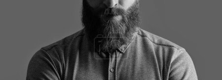 Portrait of Irish man crop view with red beard. Unshaven face with stylish beard and mustache. Bearded and mustached male studio isolated on grey.