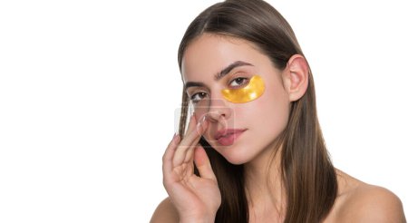 Collagen hydrogel eye patches. Skin with moisturizing patches under eyes. Young woman using patches under eyes, copy space. Beauty woman with eye patches has perfect skin. Banner.