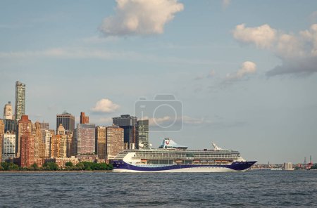 Photo for New York, USA - June 16, 2023: Cruise ship Marella Discovery Manhattan in New York. Skyline of New York Manhattan cruising on the Hudson River cruise liner TUI cruises - Royalty Free Image