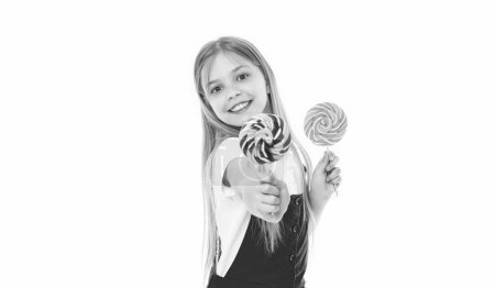 cheerful teen girl with yummy lollipop in studio. teen girl with yummy lollipop on background. photo of teen girl with yummy lollipop. teen girl with yummy lollipop isolated on white.