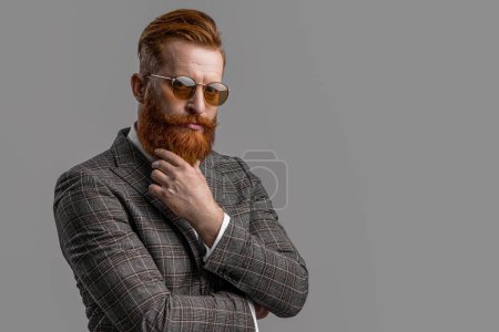 Man wear elegant formal menswear. Elegance of bearded man in formal suit. Tuxedo man in menswear isolated on grey. Redhead man in menswear tuxedo. Copy space. Classic elegance.