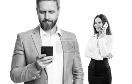 Photo for Businesspeople messaging isolated on white background, selective focus. businesspeople messaging in studio. couple of businesspeople messaging in formalwear. image of businesspeople messaging on phone - Royalty Free Image
