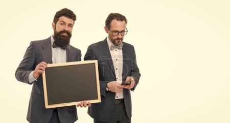 formal businessmen use phone, copy space. partners celebrate start up business isolated on white. announcement. formal party invitation. bearded men hold advertisement blackboard. welcome on board.