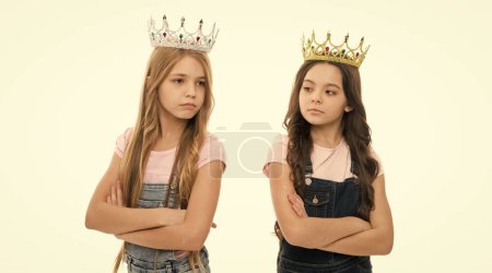 Self confidence. Leadership concept. Girls wear crowns. Spoiled children concept. Egocentric princess. Kids wear golden crowns symbol princess. Every girl dreaming become princess. Little princess.