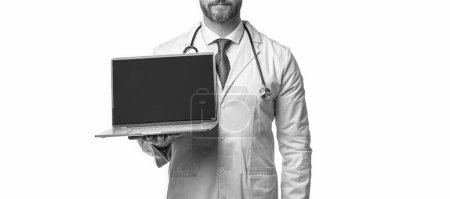 Photo for Cropped photo of emedicine and doctor man with laptop, banner. doctor promoting emedicine isolated on white. doctor offering emedicine in studio. doctor presenting emedicine on background. - Royalty Free Image