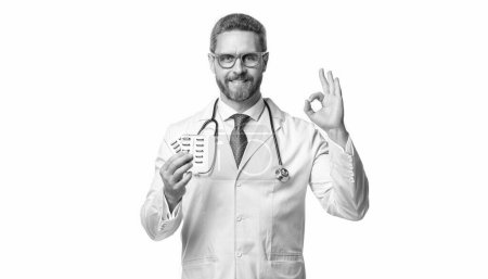 Photo for Medicine doctor with medication in studio, ok. medicine doctor with medication on background. photo of medicine doctor with medication. medicine doctor with medication isolated on white. - Royalty Free Image
