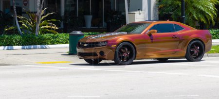 Photo for Miami Beach, Florida USA - April 15, 2021: red Chevrolet Camaro sportscar, corner view. - Royalty Free Image