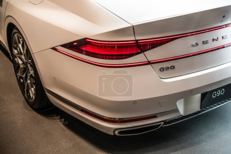 Photo for New York City, USA - August 05, 2023: Genesis G90 sedan car white color with back lights, corner view. - Royalty Free Image