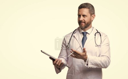 happy internist with anamnesis isolated on white. internist with anamnesis in studio. internist with anamnesis on background. photo of internist with anamnesis.