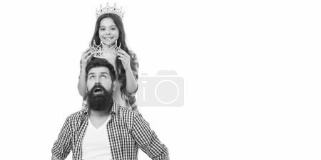 My father is super. Small daughter reward father with crown. Bearded man got reward from small child. Prize reward. Reward success. Coronation day. Royal family. Being rewarded.