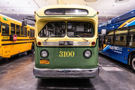 Photo for New York City, USA - March 27, 2024: 1956 Rosa Parks Bus retro school bus at New York International Auto Show, front view. - Royalty Free Image