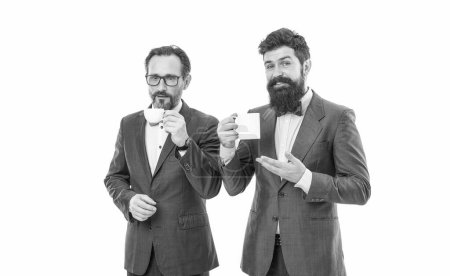 partners celebrate start up business isolated on white. business lunch. bearded men hold tea and coffee cup. businessmen in formal suit with drink. coffee break. Good morning. Morning tradition.