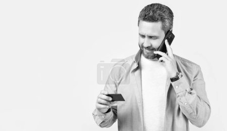 photo of man contact by call card, copy space. man contact by call card isolated on studio background. man contact by call card in studio. man contact by call card.