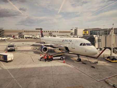 Photo for New York City, USA - May 12, 2023: delta airlines plane airplane in laguarda airport terminal before flight. - Royalty Free Image
