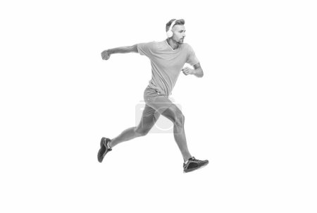sportsman runner running isolated on white backdrop. Man sportsman running for exercise in studio. sportsman jogger running. The sportsman running at full speed towards the finish line.