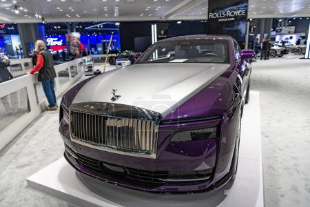 Photo for New York City, USA - March 27, 2024: Rolls Royce Spectre luxurious car at New York International Auto Show, front corner view. - Royalty Free Image