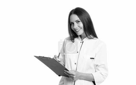 photo of cheerful doctor hold anamnesis wear white coat. anamnesis from doctor. doctor noting anamnesis isolated on white background. doctor with anamnesis in studio.