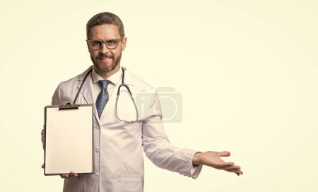 photo of internist with prescription with copy space. internist with prescription isolated on white. internist with prescription in studio. internist with prescription on background.