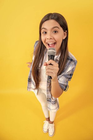 teen interviewer of gen z. interviewing for her blog. amazed teen girl blogger interviewing with microphone. young interviewer girl making interview. teen school interview. interview online.