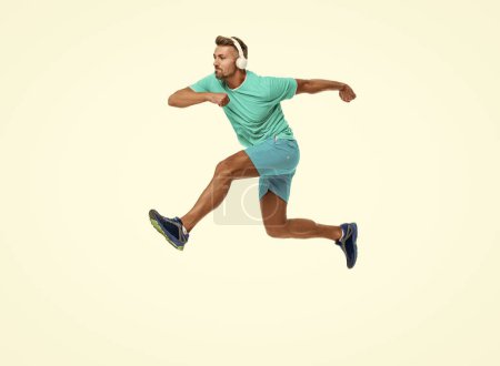 energetic athletic man sport runner sportsman running and joggig in sportswear has stamina isolated on white background.