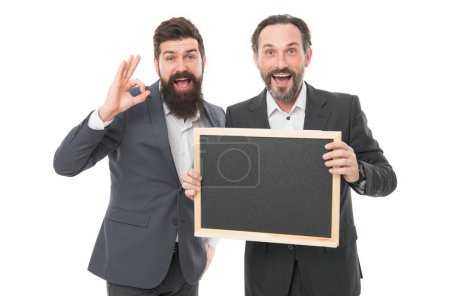 Your education your way. Happy men show ok hand holding school blackboard. Formal education. School and education. Private teaching. Teaching and learning. Focus on education, copy space.