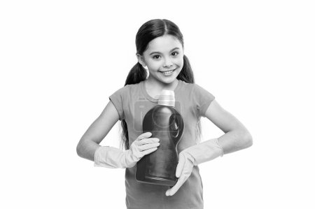 photo of girl with laundry detergent, presenting. girl with laundry detergent isolated on white. girl with laundry detergent in studio. girl with laundry detergent on background.