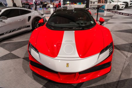Foto de Ciudad de Nueva York, Estados Unidos - 27 de marzo de 2024: Ferrari SF90 Stradale sportscar at New York International Auto Show, front view. - Imagen libre de derechos