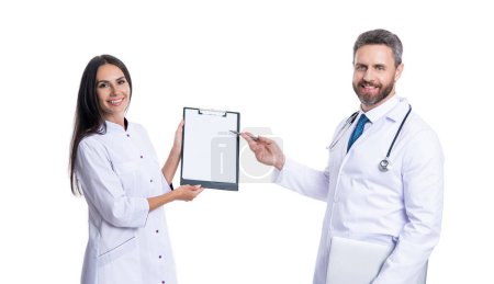 doctor internist with clipboard isolated on white. prescriber physician with nurse. showing prescription. medicine and healthcare. doctor at hospital. doctor hold medical prescription.