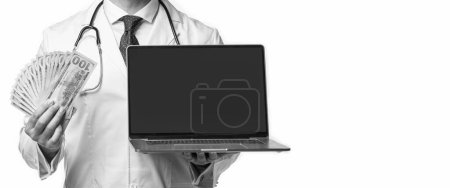 Photo for Doctor promoting ehealth insurance isolated on white, copy space. doctor offering ehealth insurance in studio. doctor presenting ehealth insurance. photo of ehealth insurance and doctor man with money - Royalty Free Image
