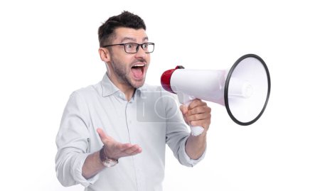 amazed shouting man announcer with megaphone. photo of man announcer with megaphone. man announcer with megaphone isolated on white background. man announcer with megaphone in studio.