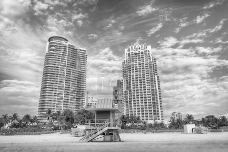 lifeguard patrol station on miami beach with skyscrapers.